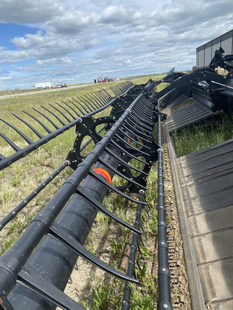 2011 MacDon Westward M150 Swather 5