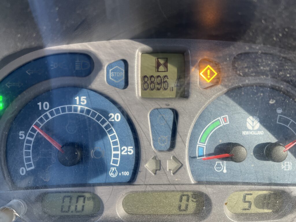 2006 New Holland TS125A Tractor w/ 840TL Loader 6